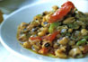 Clay-Baked Black-Eyed Peas with Peppers, Tomatoes, and Garlic
